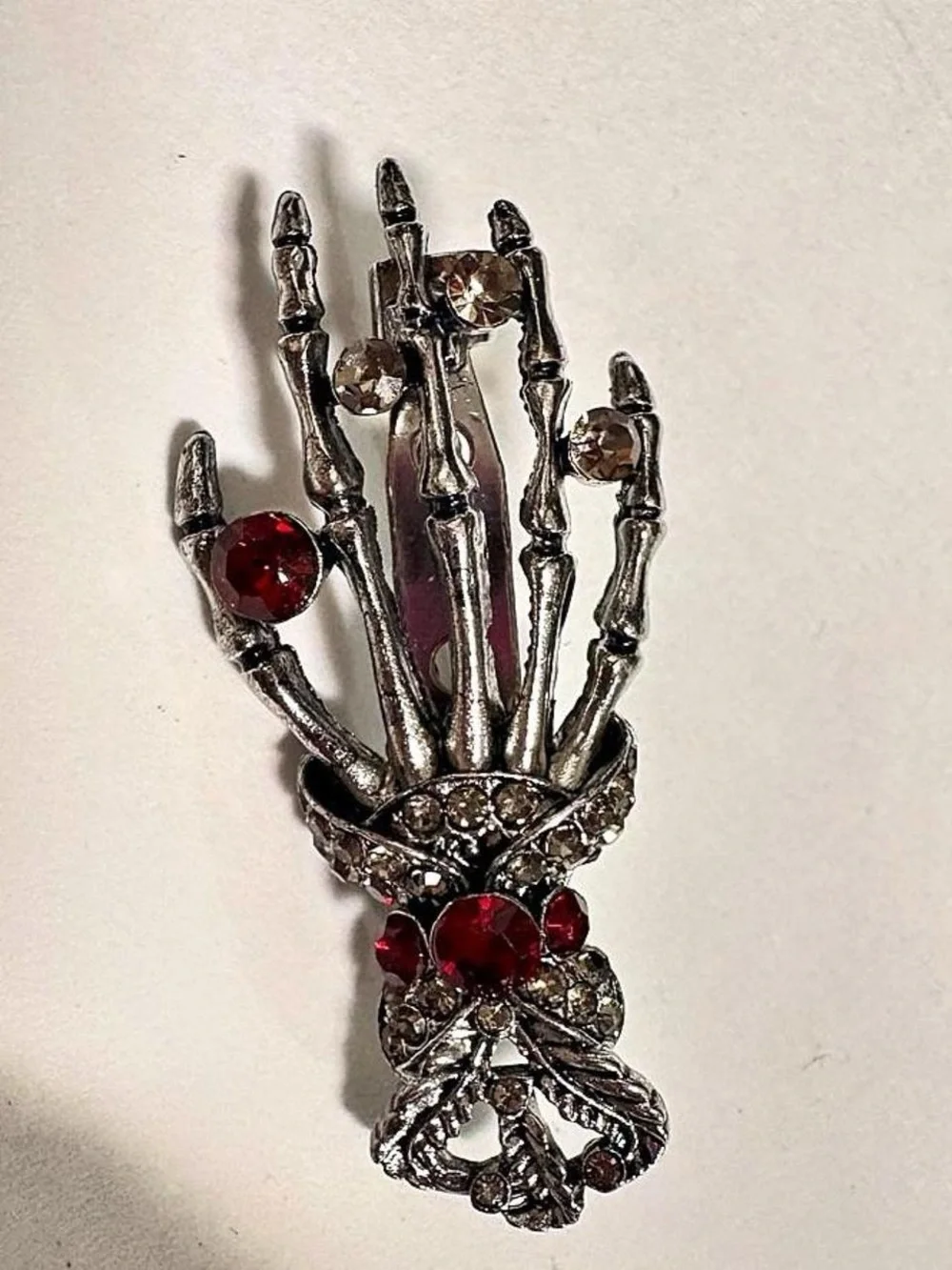Silver tone Skeleton Hand Brooch with Red and Clear rhinestones